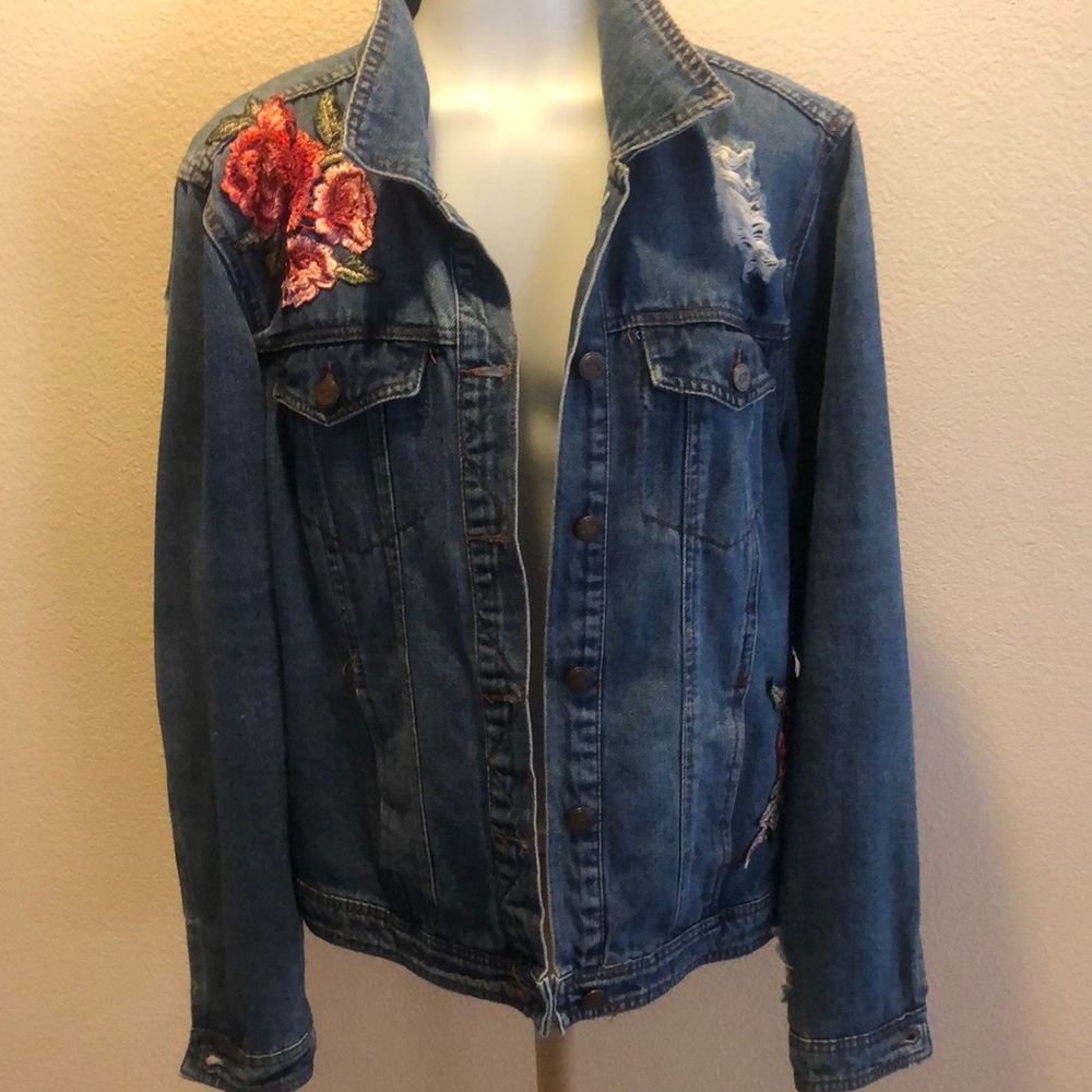 Distressed denim jacket